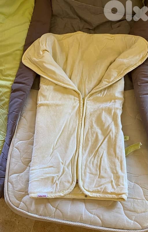 Crib, 2 mattresses, 7 blankets & mosquito net 11