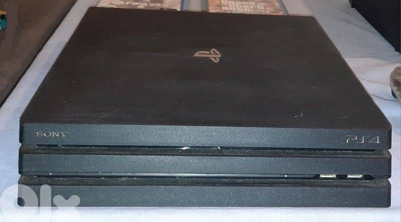 PS4 Pro 1TB with TV and accessories. 2