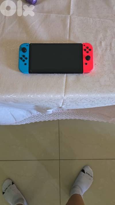 nintendo switch oled with many accessories