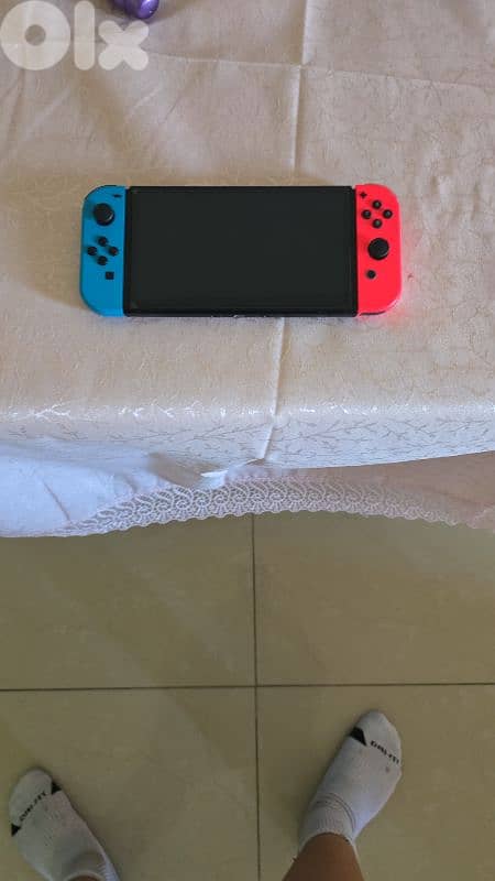 nintendo switch oled with many accessories 0