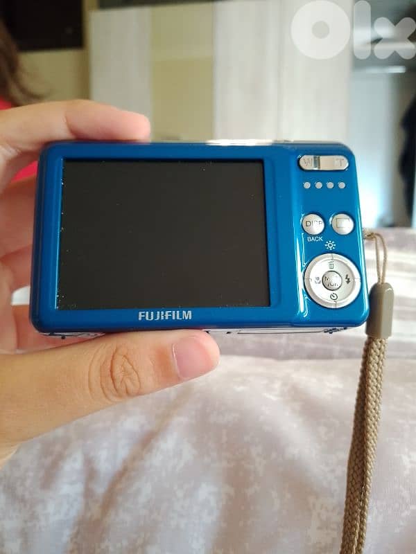 camera used no charger with me might also need batteries 1