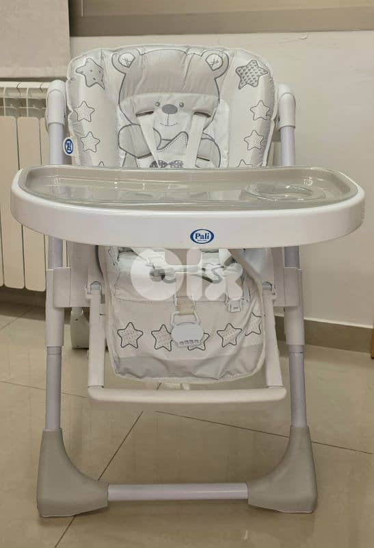High chair in excellent condition 0