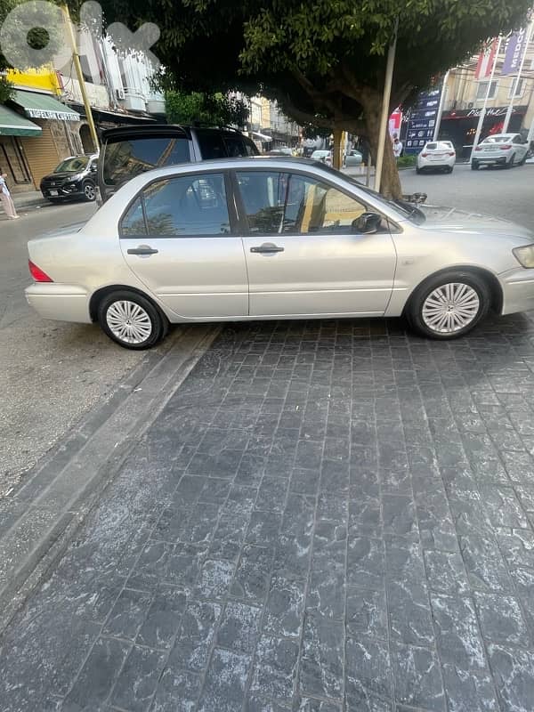 ميتسوبيشي لانسر 2003 0