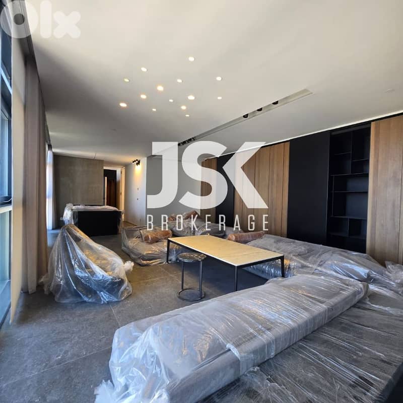 L18965 - 3-Bedroom Duplex with Sea & City View For Sale in Saifi 0