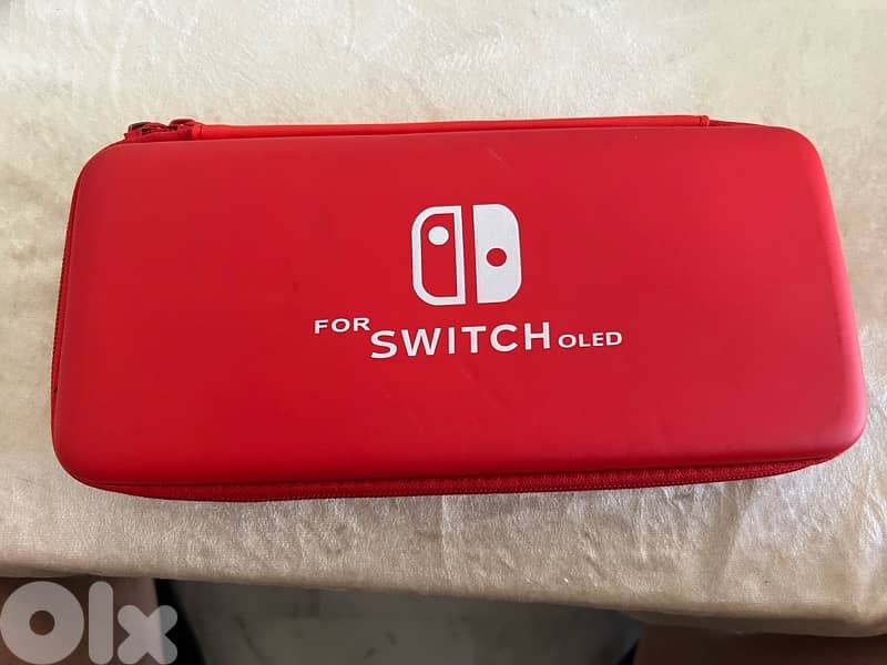 Nintendo Switch Oled used like new! With 3 Games! 14
