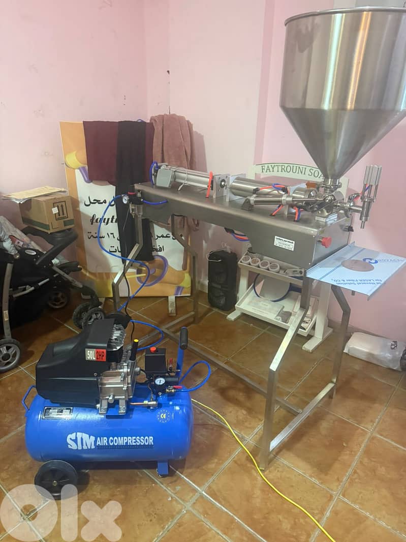 Liquid and Paste Filling Machine آلة تعبئة نصف أوتوماتيكية 1