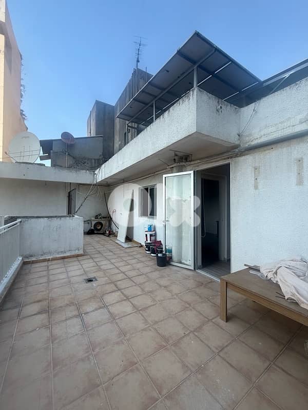 Rooftop apartment with terrace for rent in Achrafieh, prime location. 0