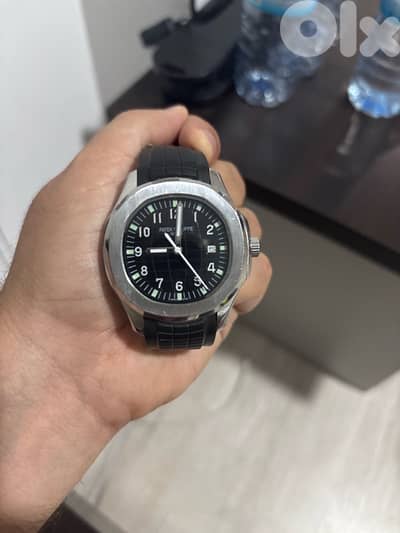 2 watches 1 Rolex and the other is patek philipe Copy A