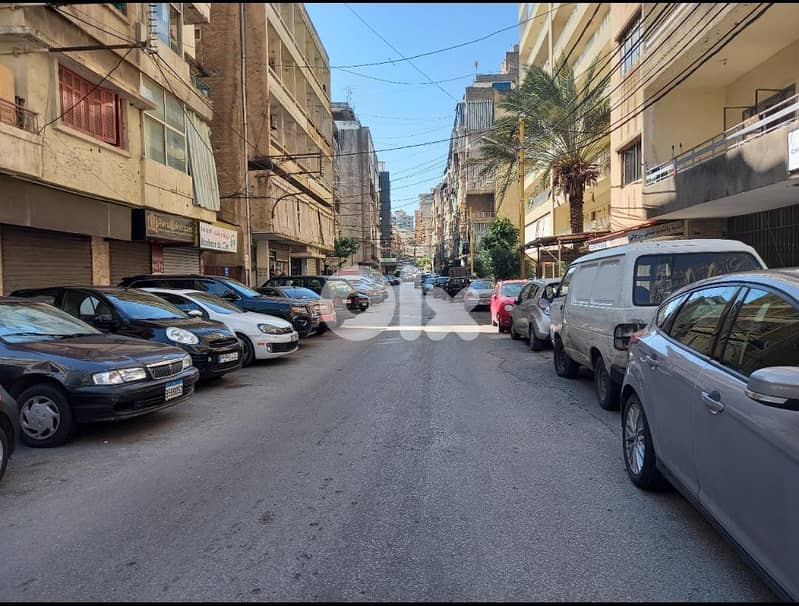 802m2 building-Prime Location-4sale in Ain El Remaneh/Wide main street 0