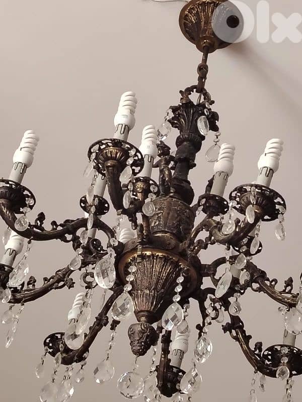dining table with eight chairs and chiffonier and chandeliers 6
