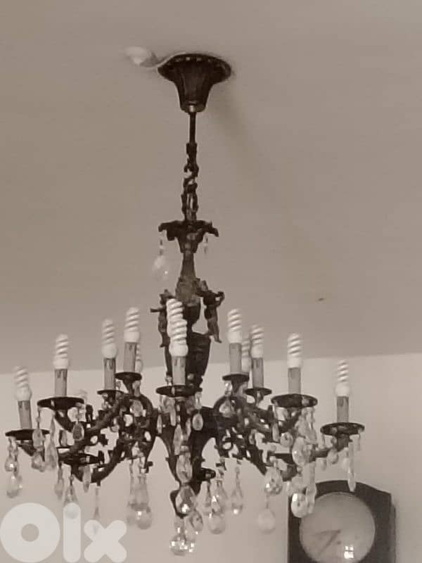 dining table with eight chairs and chiffonier and chandeliers 7