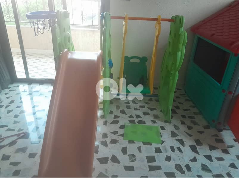 Slide with swing and house 0