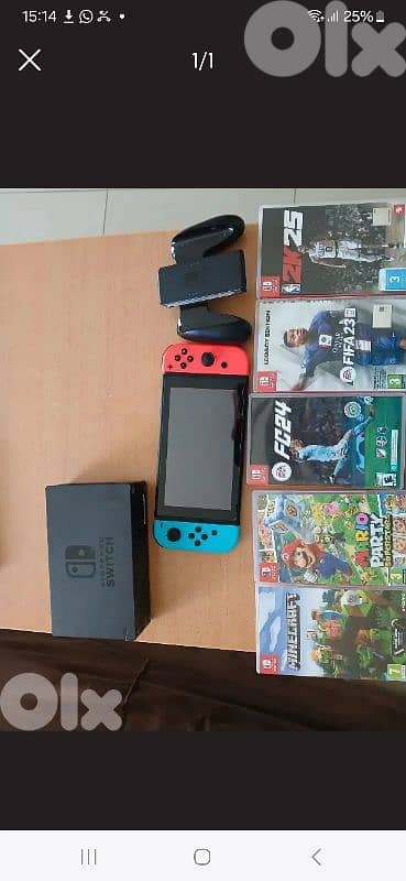 NINTENDO SWITH WITH 5 SD WITH ALL HIS ACCESSORIES 0
