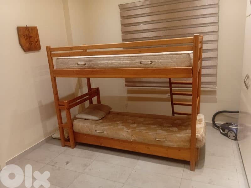 2 beds from wood with a wood leather for sale 0