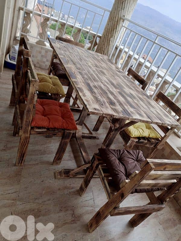 table and chairs and living room sofas 3