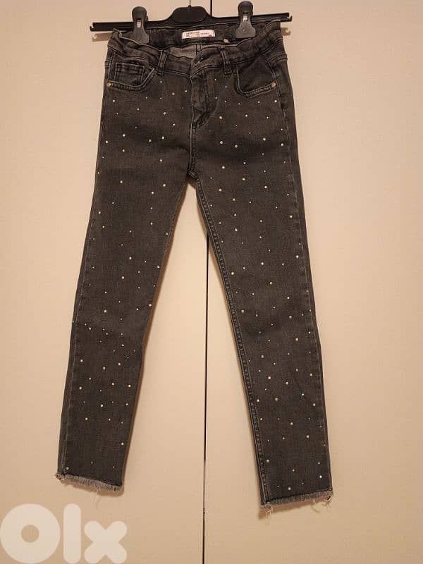 black jeans with pearls and a top as a gift 1