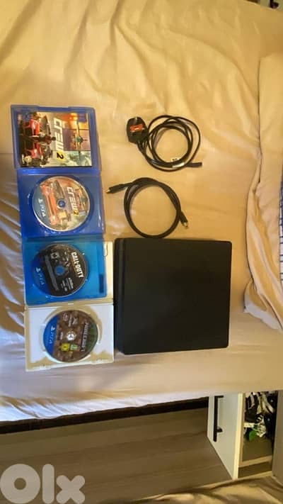 PS4 Slim + New Controller + 3 Games + Steering Wheel (Used)