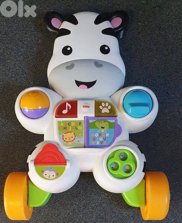 Baby walker like new & no scratches 20 $ beyrout ashrafiye  03723895 2