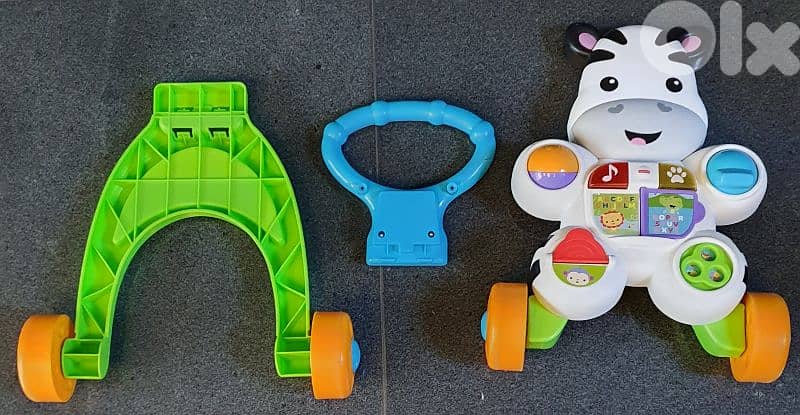 Baby walker like new & no scratches 20 $ beyrout ashrafiye  03723895 3