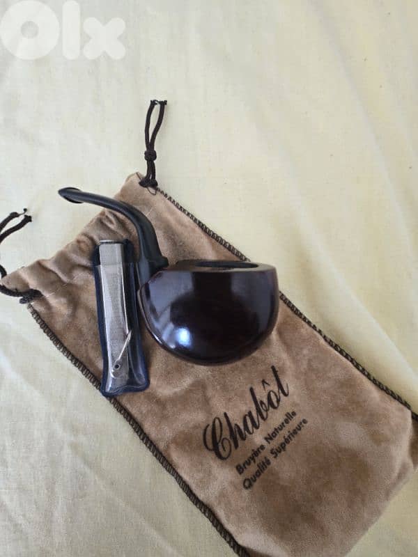 Collection of: 2 pipes + Zippo 2