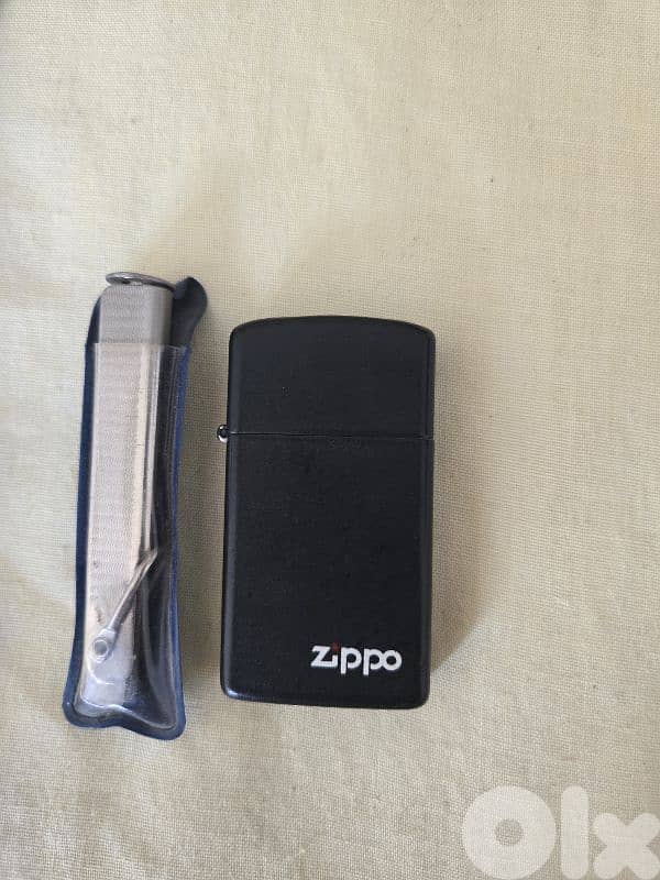 Collection of: 2 pipes + Zippo 6