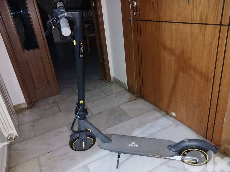 scooter electric used 2 times still new 1