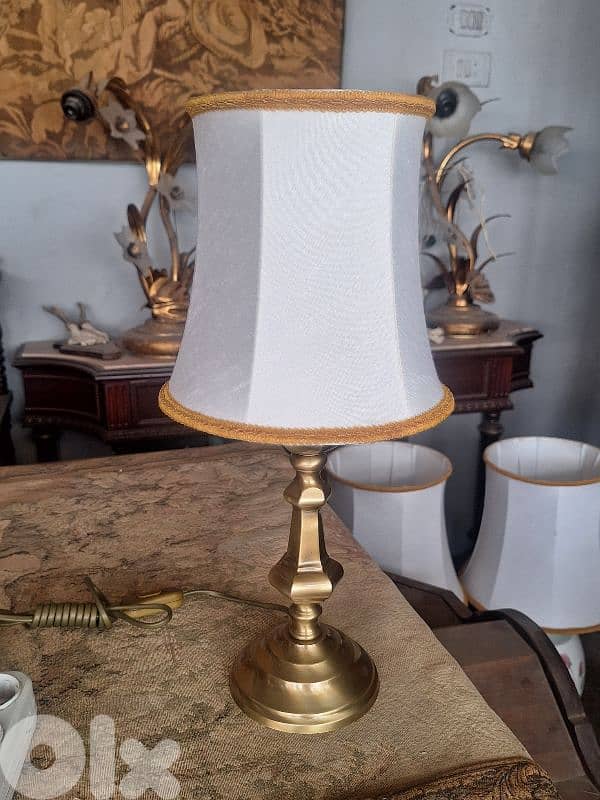 pair of brass lamps 0