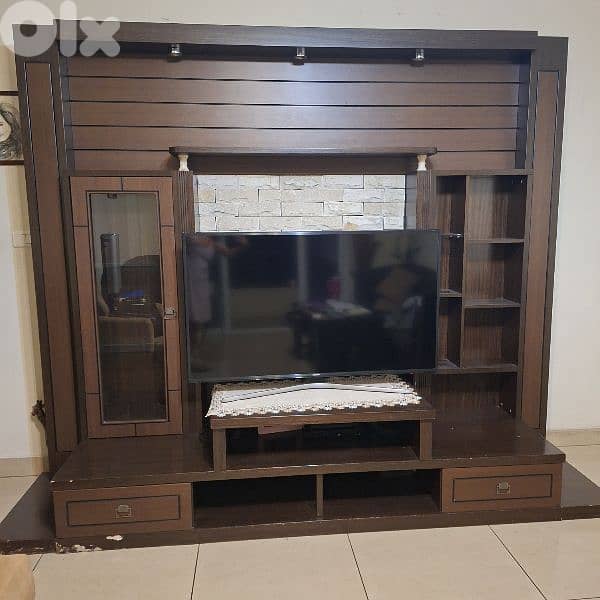 wooden TV unit with stone decoration 0