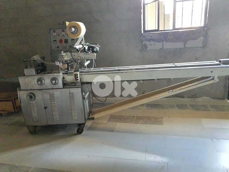 Wrapping machine, مكنة تغليف 1