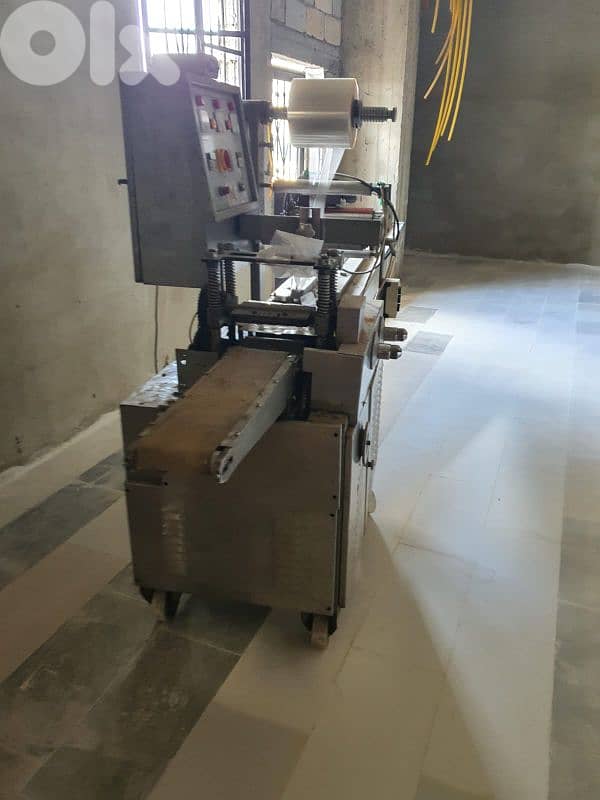 Wrapping machine, مكنة تغليف 2