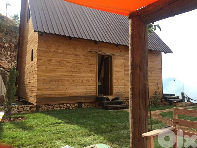 Land with a log house in Chahtoul-Nahr El Dahab 1