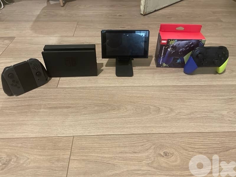 Nintendo switch with a free pro controller and a free 256gb sd card 0