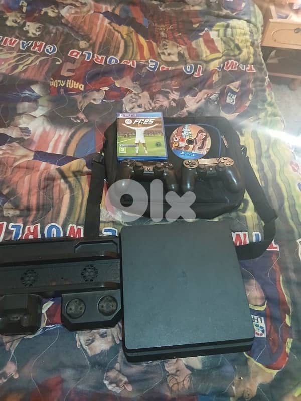 ps4 slim 2 controllers + gta 5 &fc 25 0