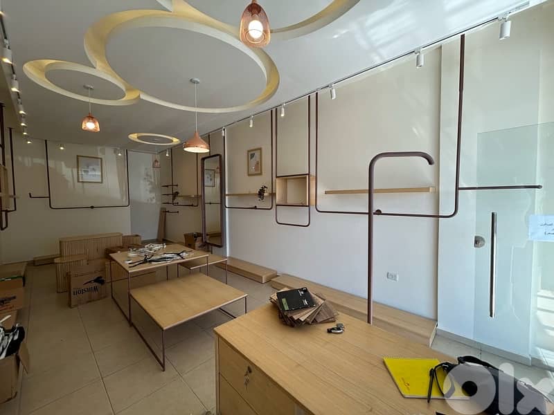 Decor for clothing store , ديكور محل ألبسة 2