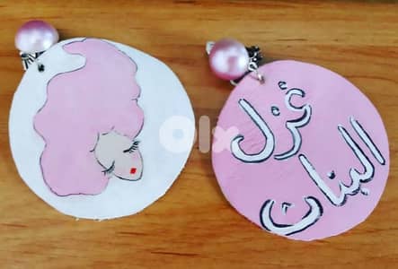 Hand painted ghazel al banat leather earrings.