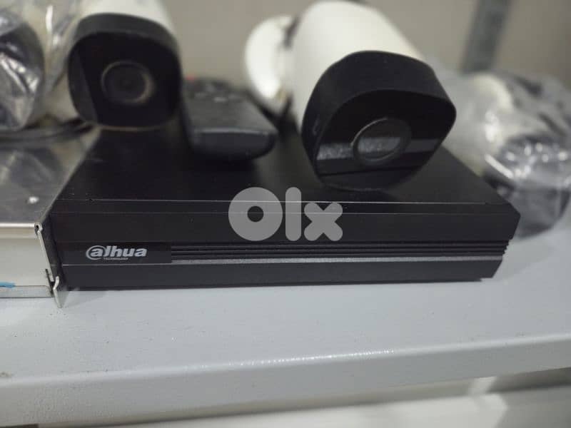 Dahua DVR 8 Channels + 5 Cameras + Power Supply 7