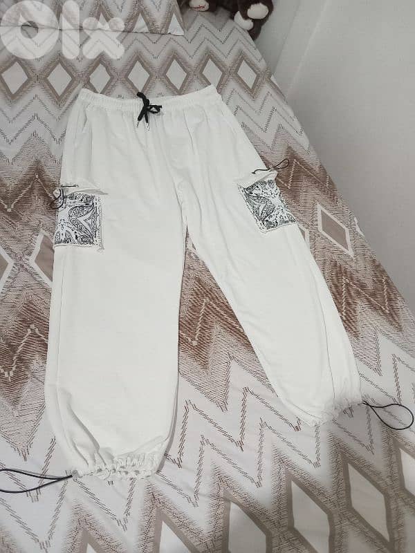 ملابس مشكلي كلو جديدة يوجد 100قطعة 14