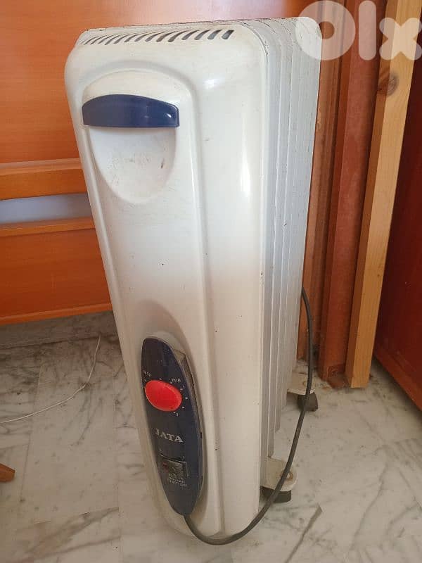 Jata Electric Heater with oil inside. 0