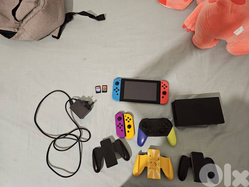 nintendo switch in perfect condition 300$ with to games 8