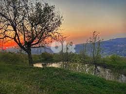LAND For SALE in FAQRA AHLAM Village with MOUNTAINS View أرض في فقرا 1