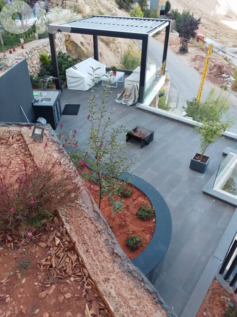 132 sqm + 300 sqm Terrace luxurious Chalet for sale in Tilal Faqra 1