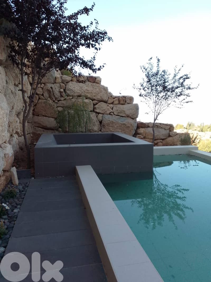 132 sqm + 300 sqm Terrace luxurious Chalet for sale in Tilal Faqra 4