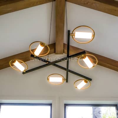 Modern Cross Pendant Chandelier | 6-Light Halo Design in Black & Gold