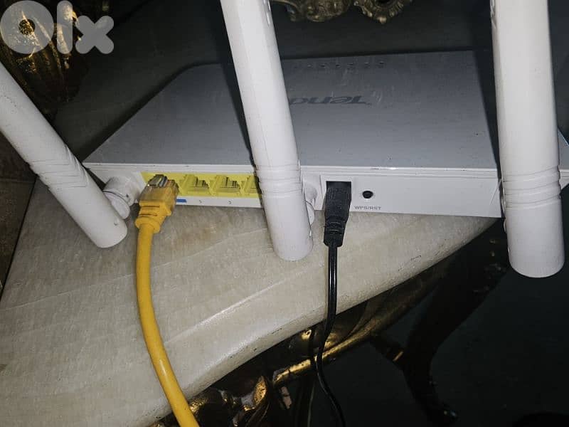 2 routers TP Link & Tenda used in very good condition 2
