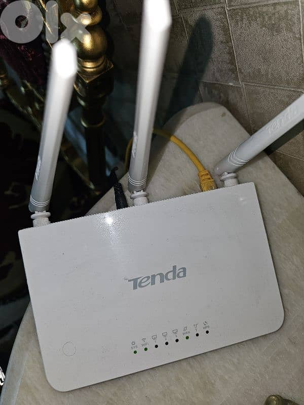 2 routers TP Link & Tenda used in very good condition 3