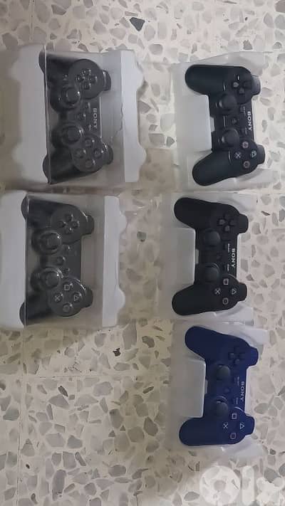 PlayStation3 with 5 controllers and 9 games with 1 charger