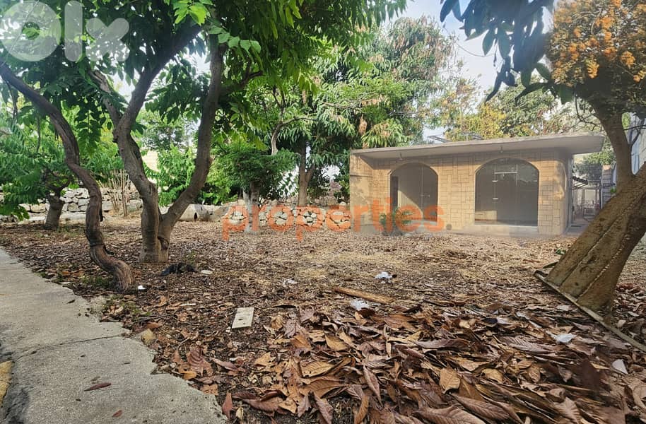 Land with house and shops for sale in Aamchit – Jbeil – CPJMH20 0