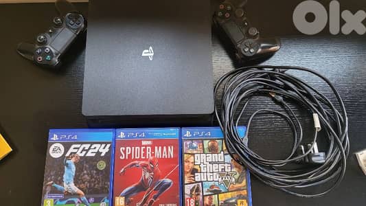 PS4 slim 1000gb/2 controllers/ups /3 cds/all cables included
