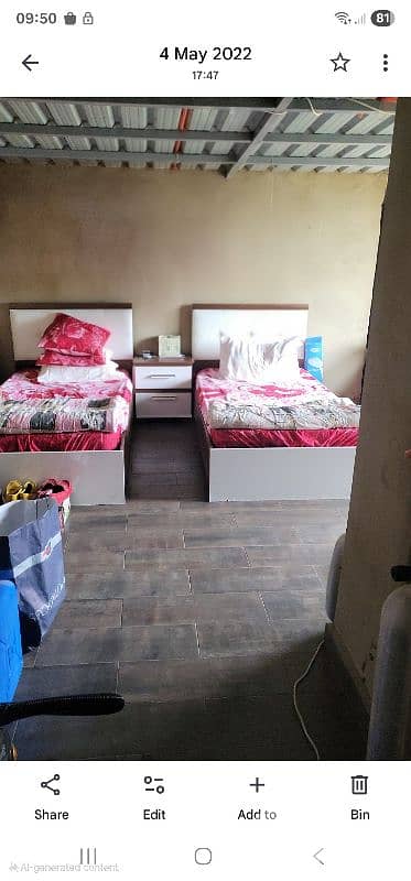 used 2 beds and one night table