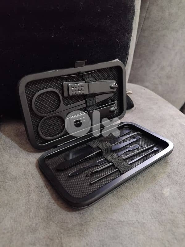 8-piece all-black manicure & pedicure set. 1